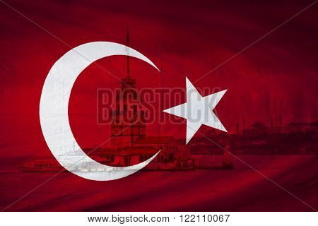 Turkish flag with view of The Maidens Tower also known as Leander's Toweri n Bosphorus strait seen in background, Istanbul, Turkey