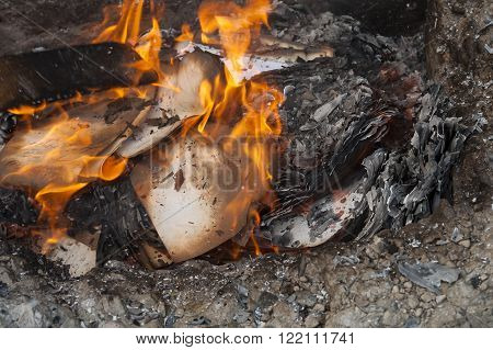 Burning Office White Paper In Bonfire