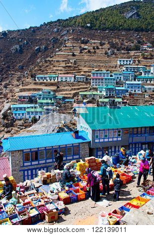 NAMCHE BAZARNEPAL-MARCH 7: Traditional Saturday market in Namche Bazar on March 7 2014 Khumbu district Himalayas Nepal