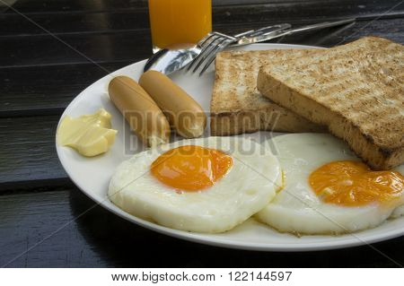 breakfast with sausages toast and jam meal
