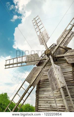 Wooden mill in outdoor ukrainian national falk historical village in Kiev