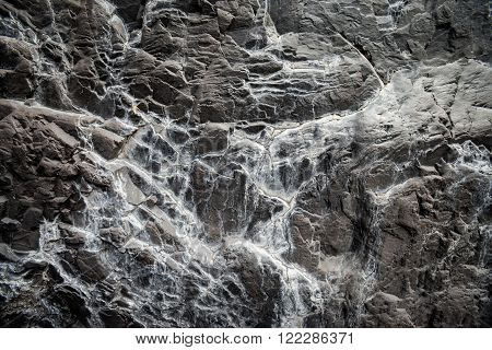 Closeup of volcanic rocks on tropical island Tenerife Canary in Spain. Gorge trekking scenics from Masca Valley.