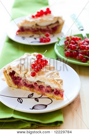 Piece of red currant meringue tart