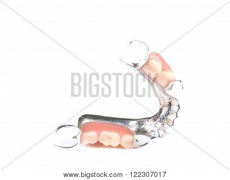 Denture, false teeth isolated on whited background.