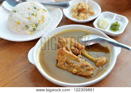 Selective focus of massaman curry with chicken and rice, popular Thai food