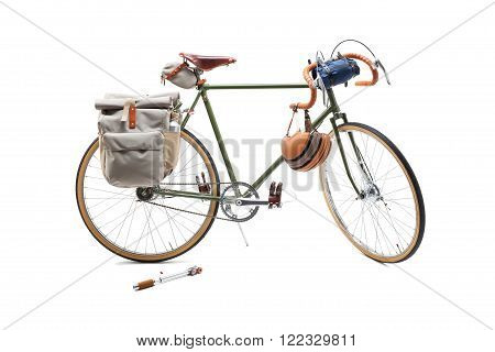 Vintage green road bicycle isolated on white.