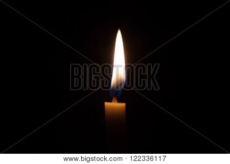 Fire and yellow candlelight in the dark room