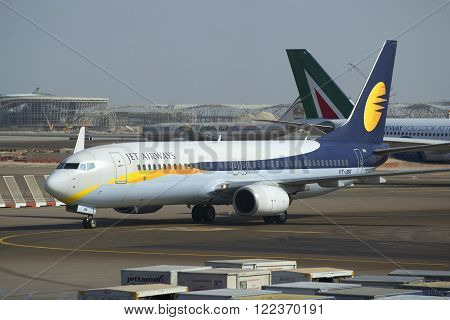 ABU DHABI, UAE - MARCH 27, 2015: Boeing 737 Next Gen (VB-JBK) airlines Jet Airways closeup. Abu Dhabi Airport