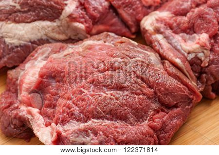raw meat delicious veal Beef Cheeks - best meat for tasteful gourmet slow cooking
** Note: Shallow depth of field