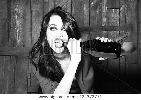 Woman Opening Wine Bottle