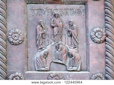 PISA, ITALY - JUNE 06, 2015: Transfiguration of Christ on the San Ranieri gate of the Cathedral St. Mary of the Assumption in Pisa, Italy on June 06, 2015