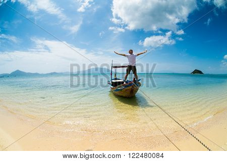 Young tourist on the boat in Diep Son island in Khanh Hoa province, Vietnam.