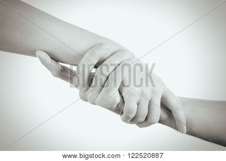 Two hands reaching toward each other. Helping concept. Vintage tone