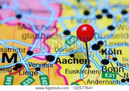 Photo of pinned Euskirchen on a map of Germany. May be used as illustration for traveling theme.