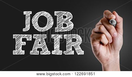 Hand writing the text: Job Fair