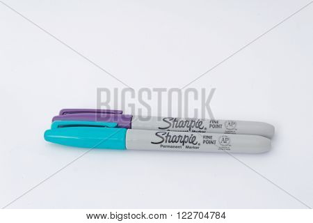 JOHOR, Malaysia-March 21, 2016: Sharpie brand permanent over wood background. Sharpie is an American manufacturer of writing instruments whose products are sold in over 20 countries.