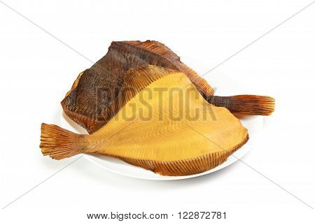 Two hot smoked flatfish on plate isolated on white