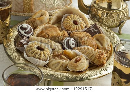 Traditional Moroccan festive cookies with tea 