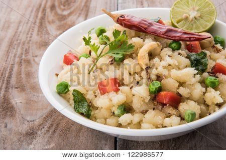 Rava Upma - Popular south Indian breakfast wiih semolina and vegetables, selective focus, Upma or upama is a South Indian breakfast, cooked from dry roasted semolina. seasonings of vegetables
** Note: Soft Focus at 100%, best at smaller sizes