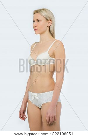 Snap Models.Portrait of a beautiful Blonde Woman in underwear isolated on white background