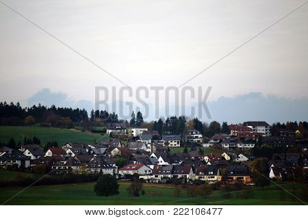 The view over landscapes and houses of the district Watzenborn-Steinberg the in the city of Pohlheim in the district Giessen.