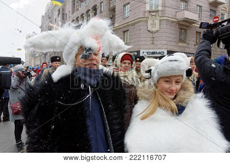 Kharkiv, Ukraine - January 13, 2018 - Participants traditional Christmas of Verteps Parade (nativity Scene), Christmas stars, carols singing. People wearing carnival clothes posing and smiling. Winter outdoor image.