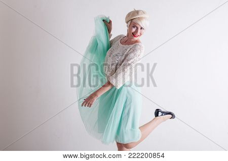 beautiful French blonde in a light dress 