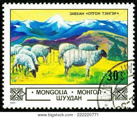 Ukraine - circa 2018: A postage stamp printed in Mongolia show Domestic Sheep or Ovis ammon aries in the Highlands. Series: Animals and landscapes. Circa 1982.