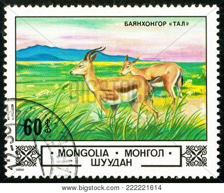 Ukraine - circa 2018: A postage stamp printed in Mongolia show Goitered Gazelle or Gazella subgutturosa in Bajanchongor Step. Series: Animals and landscapes. Circa 1982.