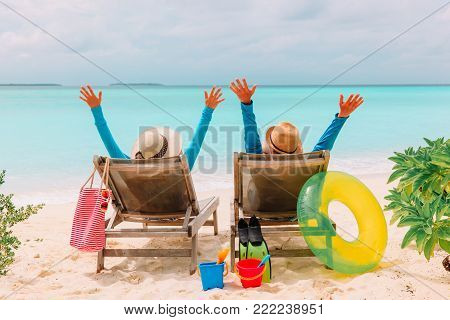 happy couple relax on a tropical beach vacation