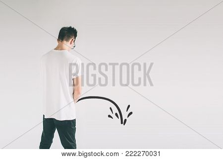 man is urinating. tream of urine drops from height on the ground. Simple isolated.