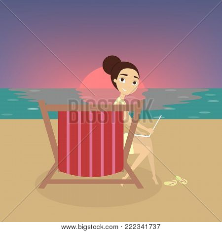 Freelance on beach. Woman on chair with laptop ner sea.