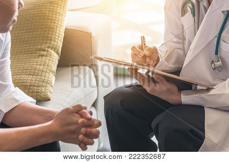Woman Patient Having Consultation With Doctor (gynecologist Or Psychiatrist) And Examining  Health I