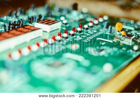 closeup of a microchip on the electronic Board from the pedal guitar effects