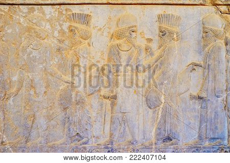 Persepolis, Iran - October 13, 2017: The Ancient Relief On Wall Of Eastern Stairway Of Apadana Palac
