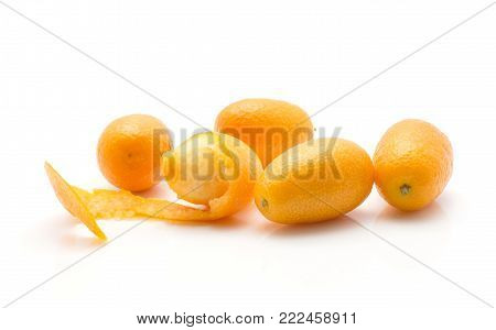 One peel kumquat and four whole isolated on white background