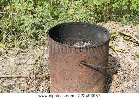Steel tank and rust used to burn garbage