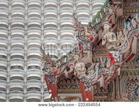 Colorful of sculpture angle doll and serpent in thai temple, Thailand. Generally in Thailand, any kinds of decorated in Buddhist church, etc. they are public domain of Buddhism