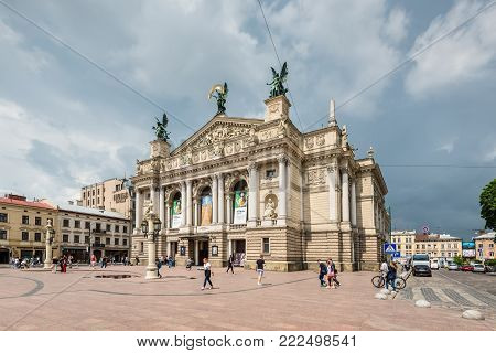 Lviv, Ukraine - May 31, 2016: People walk in front of the National Academic theatre of opera and ballet named after Solomiya Krushelnytska in cloudy weather in Lviv, Ukraine.