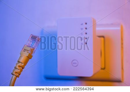 Wifi Repeater In Electrical Socket On The Wall