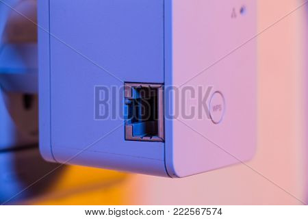 Wifi Repeater In Electrical Socket On The Wall