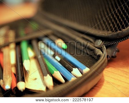 Colored Pencils and Art Supplies in Pencil Case