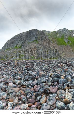 Rocky cliffs on the coast of the Barents Sea, Varangerhalvoya National Park, Varanger Peninsula, Finnmark, Norway