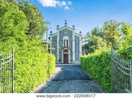small San Venanzio Abate rural church in Busana, Emilia Apennines, Italy