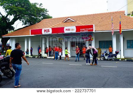 Labuan,Malaysia-Jan 18 2018:View of Pos Malaysia Berhad office in Labuan island,Malaysia.Pos Malaysia Berhad is a postal delivery service in Malaysia,with history dating back to early 1800s.