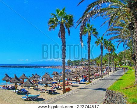 TENERIFE, CANARY, SPAIN - OKTOBER 2013: Playa de las Americas beach. This is the most famous beach of Tenerife