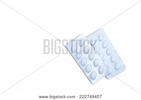 Statins tablets pill in white blister pack for light resistance packaging isolated on white background. Medicine for treatment dyslipidemia. Lipid lowering tablets pills. Statins : Hyperlipidemia.