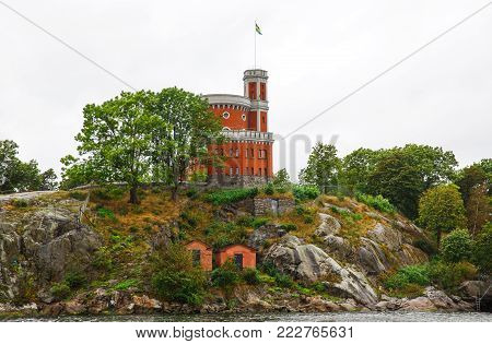 Kastellet with Swedish flag on Kastellholmen island in Stockholm, Sweden.