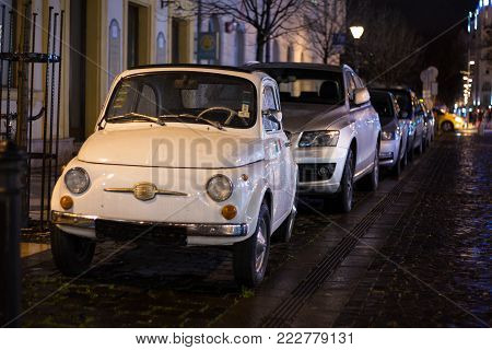 Budapest, HUNGARY - Jan 19 2018: Fiat 500 vintage old car parked on street. Fiat 500 was one of the most produced European cars manufactured in years 1957-1975.