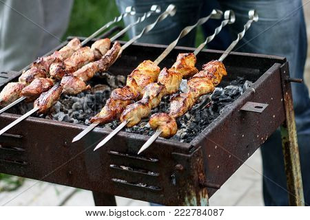 Shish kebab on skewers roasted on grill